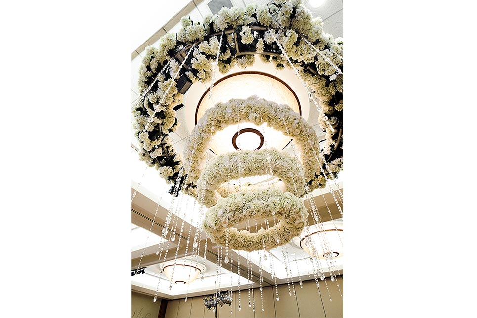 Three Designers Take Wedding Flowers to New Heights with Chic Floral Chandeliers